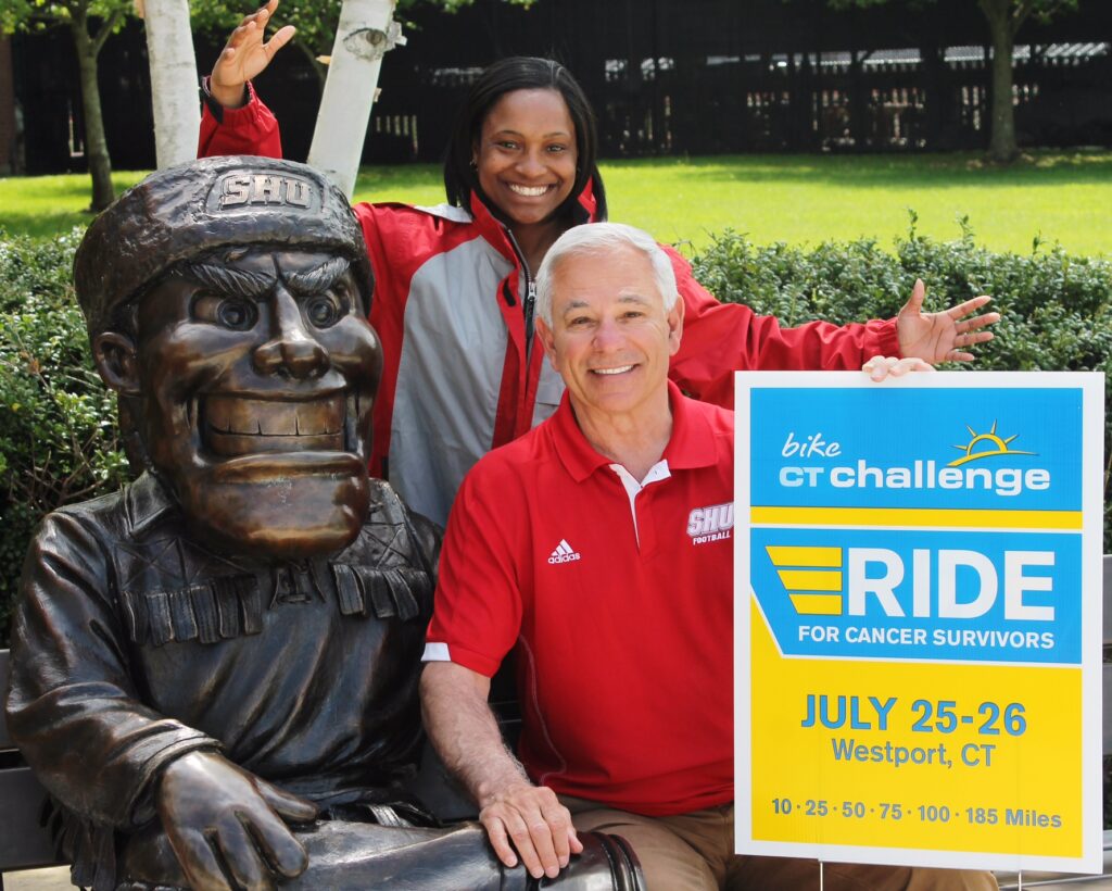 Bobby Valentine, the honorary chair for the 10th annual CT Challenge Bike Ride, with Sacred Heart director of promotions Tiana Williams.