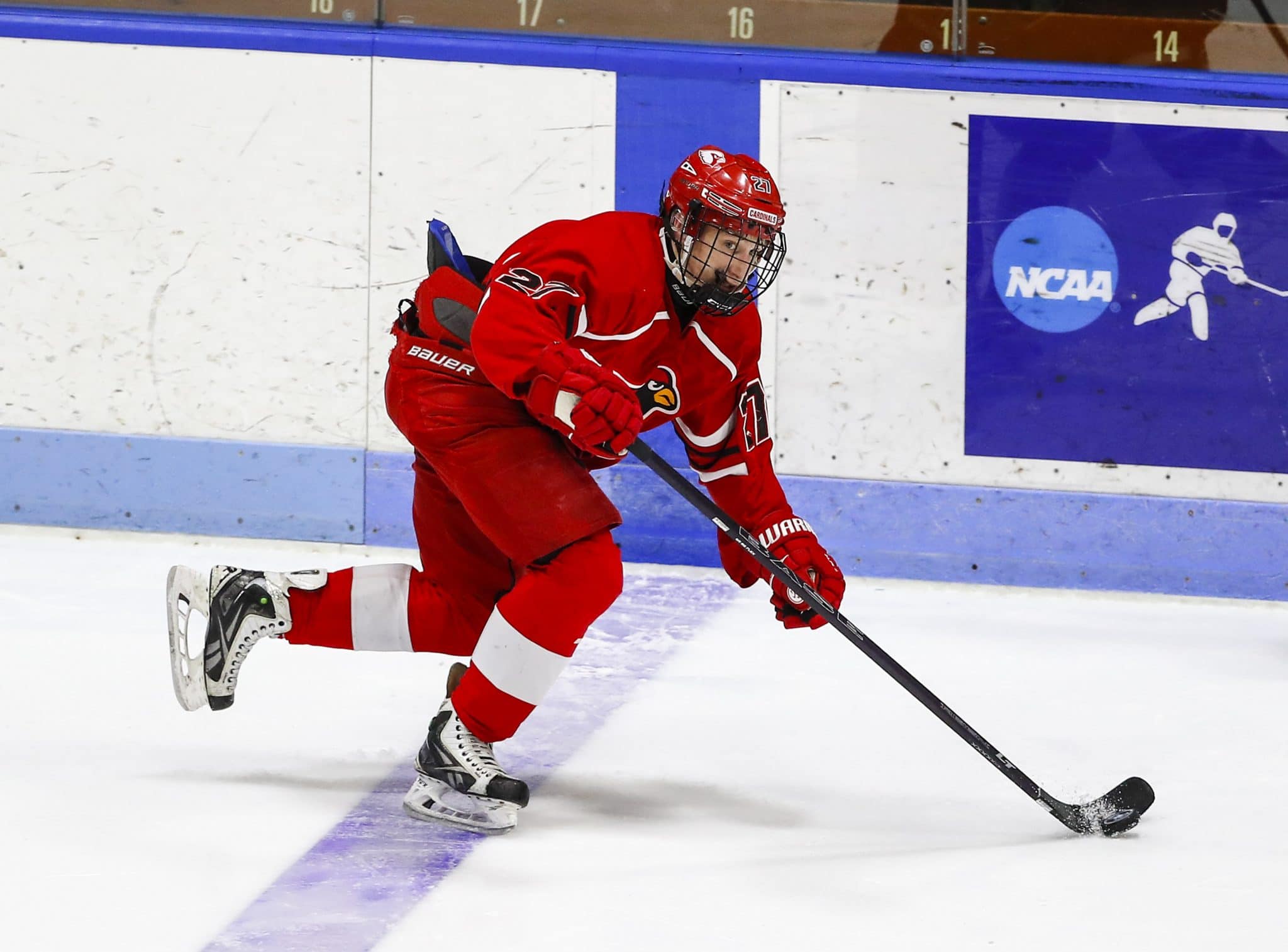 Greenwichs Nikita Kovalev skates the puck at the blue line. - The Ruden  Report