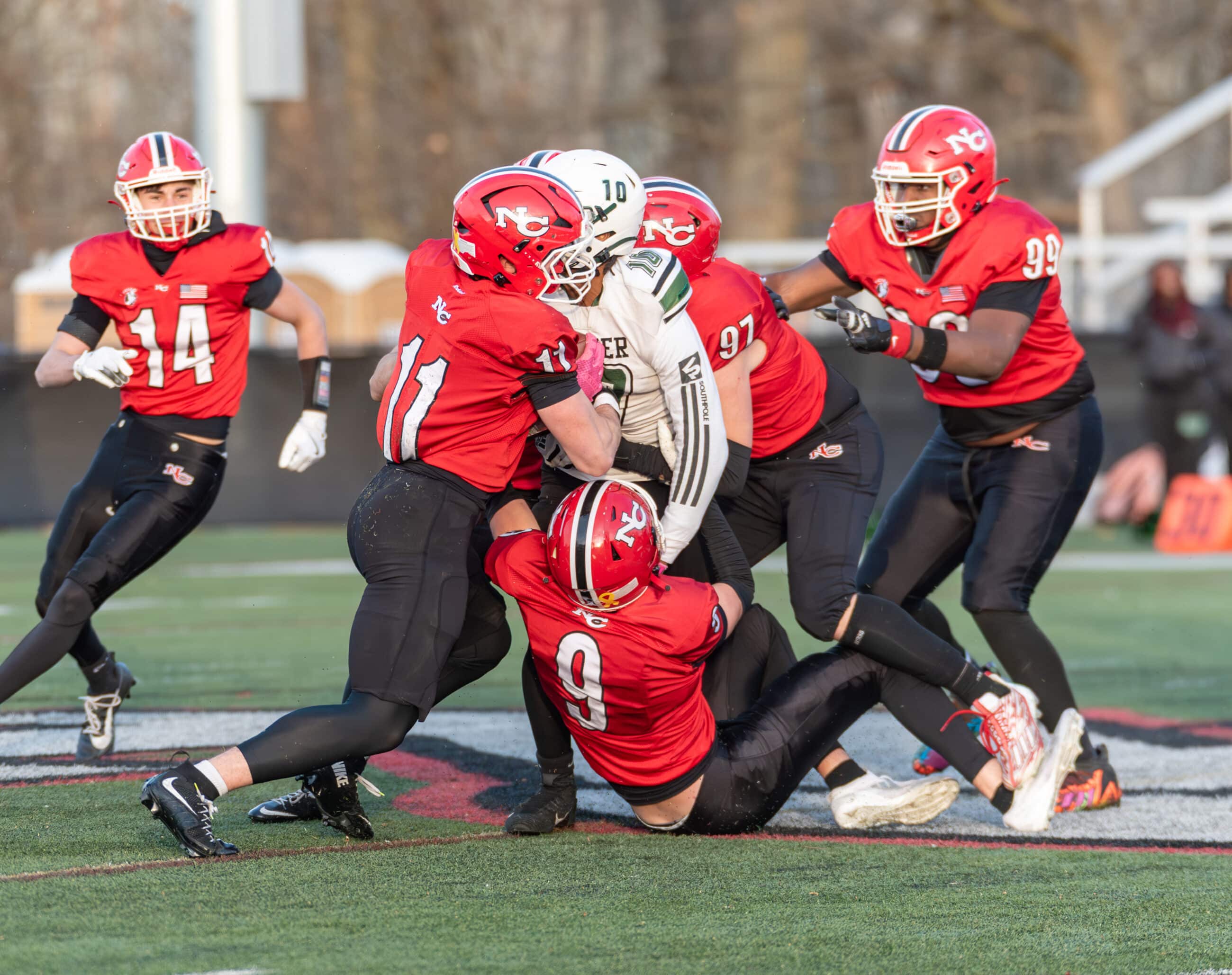 #9 Luke Gencarelli, #11 Ryan Brooks, #97 Michael Harris with the take ...